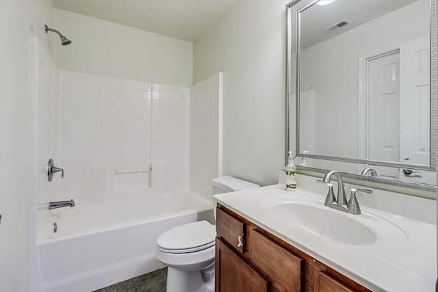 full bathroom featuring vanity, tub / shower combination, and toilet