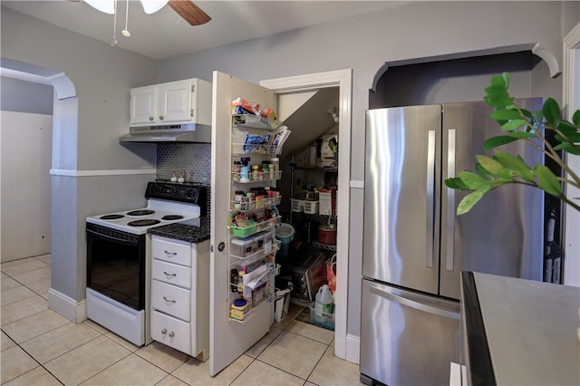 kitchen featuring white cabinetry, stainless steel refrigerator, light tile patterned floors, electric range, and ceiling fan