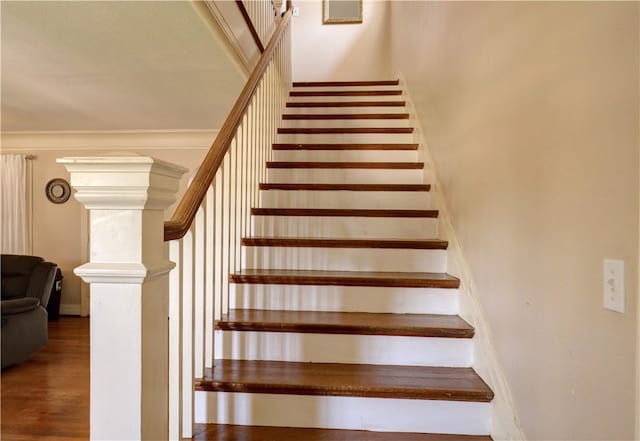 stairway featuring hardwood / wood-style floors