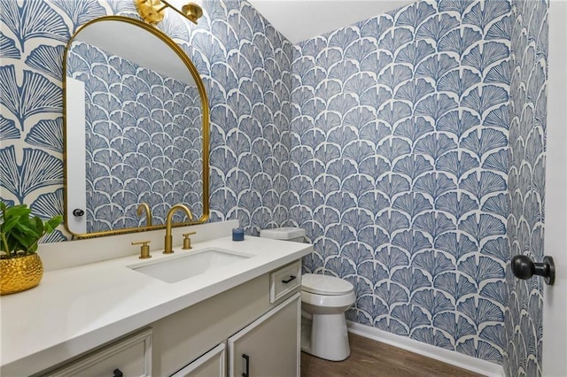 11029 Stonewall Blvd, Corpus Christi, TX 78410 - full bathroom featuring wallpapered walls, vanity, and wood finished floors