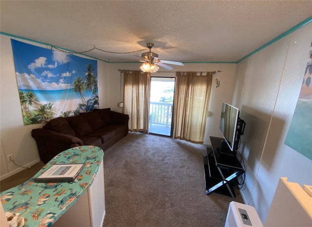 living room featuring ceiling fan, a textured ceiling, and dark carpet