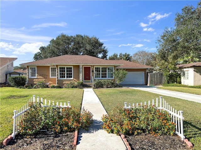 ranch-style home featuring a front yard and a garage