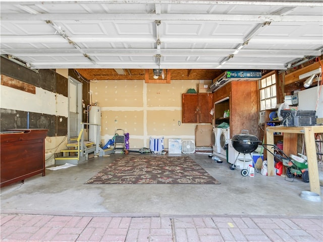 garage featuring washing machine and dryer