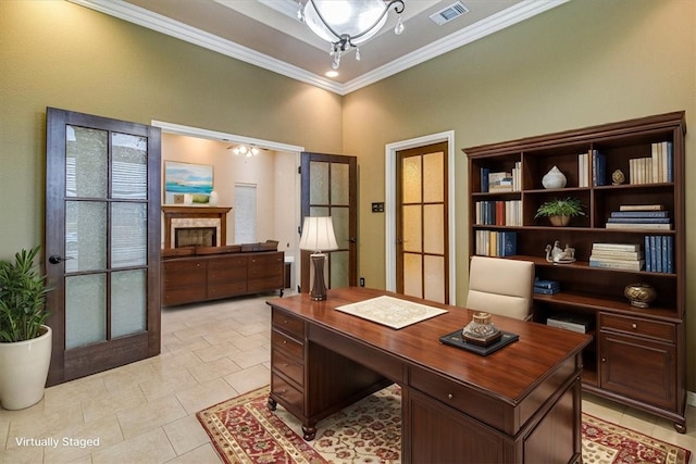 home office featuring crown molding and light tile patterned floors