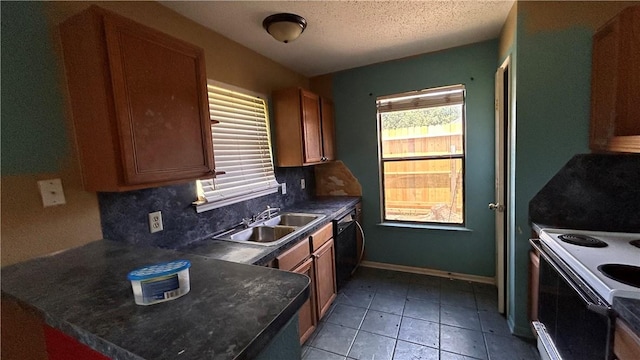 2993 Todd Cir, Ingleside, TX 78362 - kitchen with plenty of natural light, a sink, white electric range, backsplash, and a textured ceiling