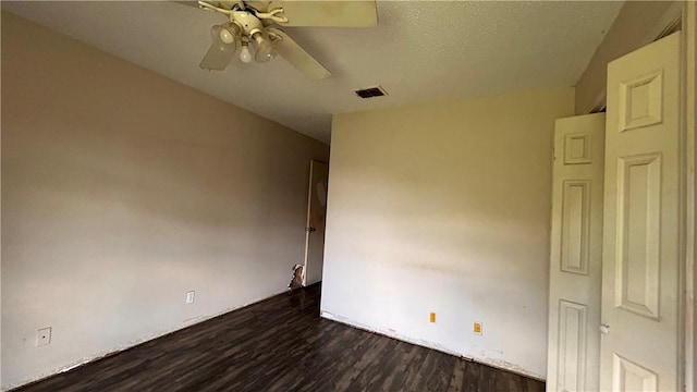 2993 Todd Cir, Ingleside, TX 78362 - spare room with dark wood-type flooring and ceiling fan