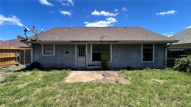 2993 Todd Cir, Ingleside, TX 78362 - back of property featuring fence and roof with shingles