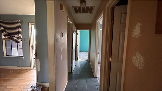 2993 Todd Cir, Ingleside, TX 78362 - hallway with tile patterned flooring and baseboards