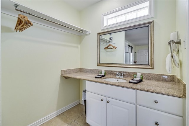 bathroom featuring vanity and tile patterned flooring