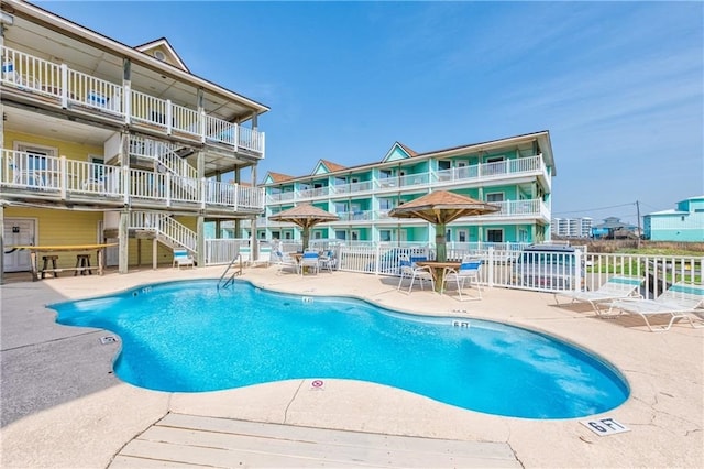 view of pool featuring a patio