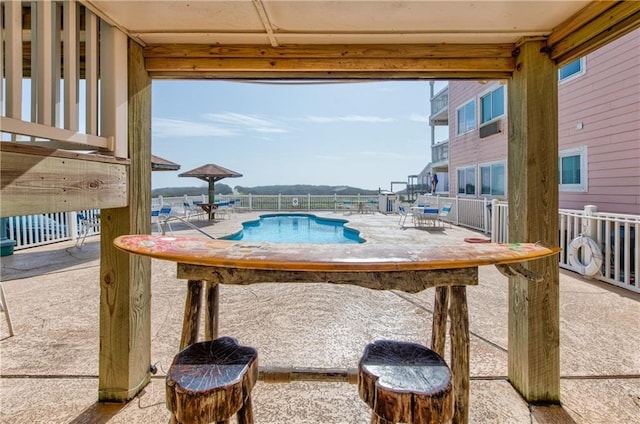 view of pool with a patio area