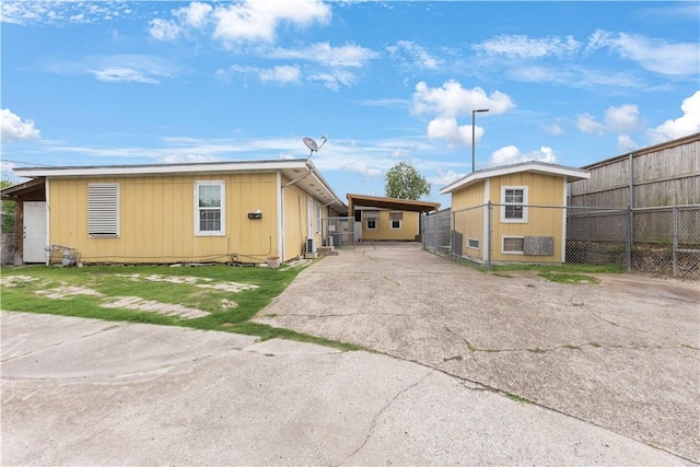1206 Hibiscus St, Corpus Christi, TX 78405 - back of property featuring fence and driveway