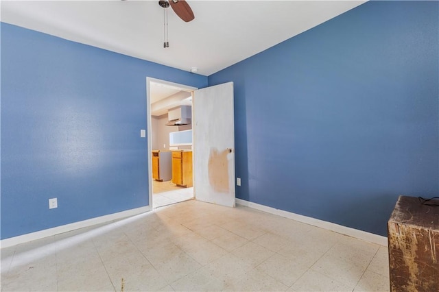 1206 Hibiscus St, Corpus Christi, TX 78405 - empty room with baseboards and ceiling fan