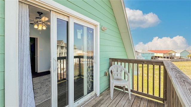 wooden balcony featuring a deck