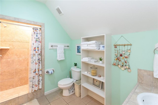 bathroom featuring a shower with shower curtain, tile patterned floors, toilet, and lofted ceiling