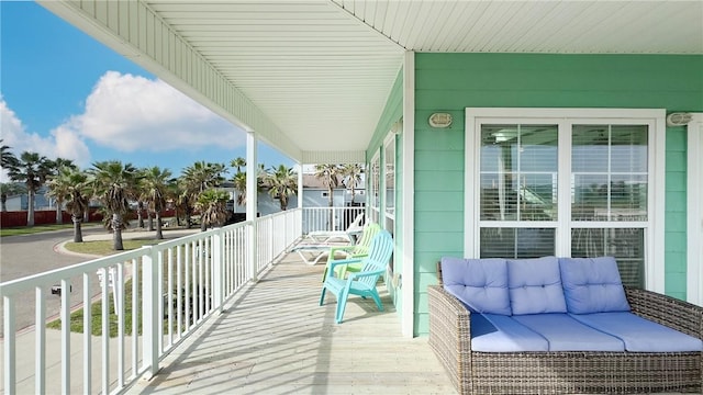 balcony featuring a porch