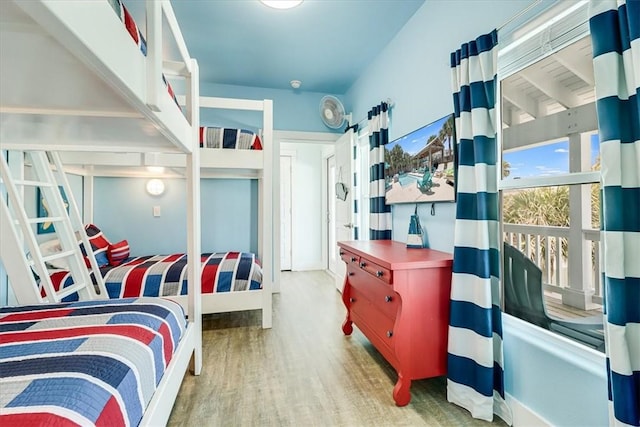 835 Ocean Side Dr, Port Aransas, TX 78373 - bedroom featuring wood finished floors