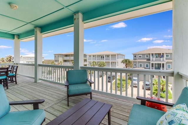 835 Ocean Side Dr, Port Aransas, TX 78373 - wooden deck featuring a residential view