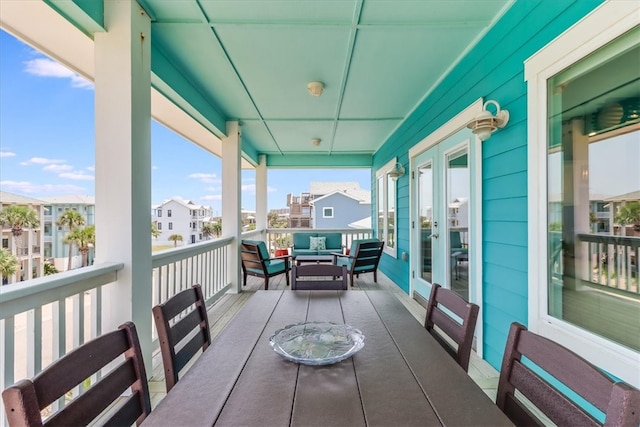 835 Ocean Side Dr, Port Aransas, TX 78373 - balcony featuring outdoor lounge area and a residential view