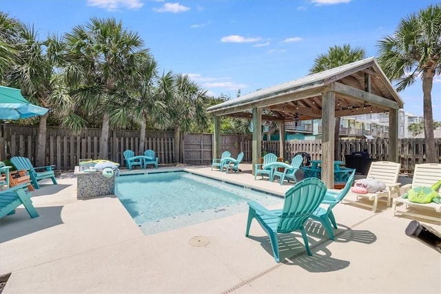 835 Ocean Side Dr, Port Aransas, TX 78373 - view of pool featuring a gazebo, a patio, and a fenced backyard