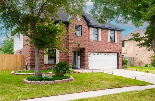 5025 Queens Ct, Corpus Christi, TX 78413 - view of front of home featuring brick siding, driveway, and an attached garage