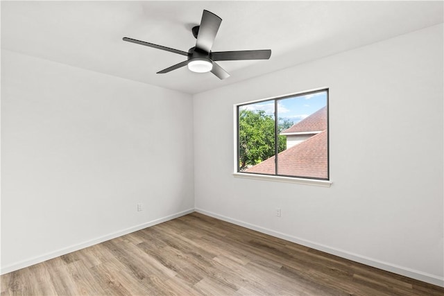 5025 Queens Ct, Corpus Christi, TX 78413 - unfurnished room with wood finished floors and a ceiling fan