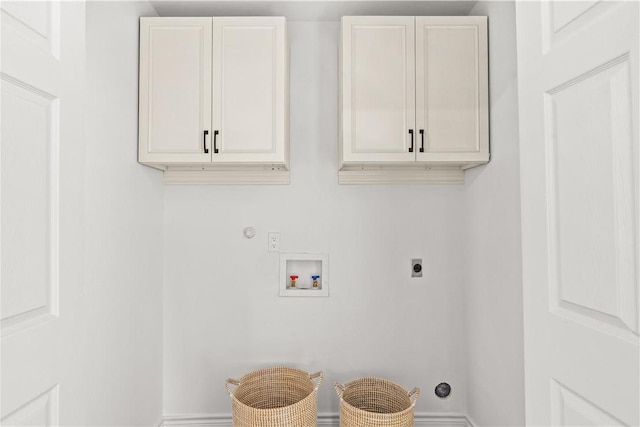 5025 Queens Ct, Corpus Christi, TX 78413 - laundry area featuring electric dryer hookup, washer hookup, and cabinet space