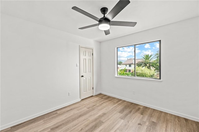 5025 Queens Ct, Corpus Christi, TX 78413 - empty room featuring light wood-style flooring and a ceiling fan