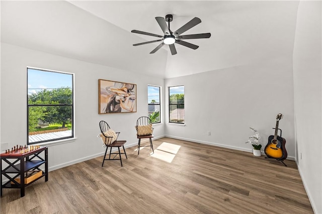 5025 Queens Ct, Corpus Christi, TX 78413 - sitting room with wood finished floors, a ceiling fan, and lofted ceiling