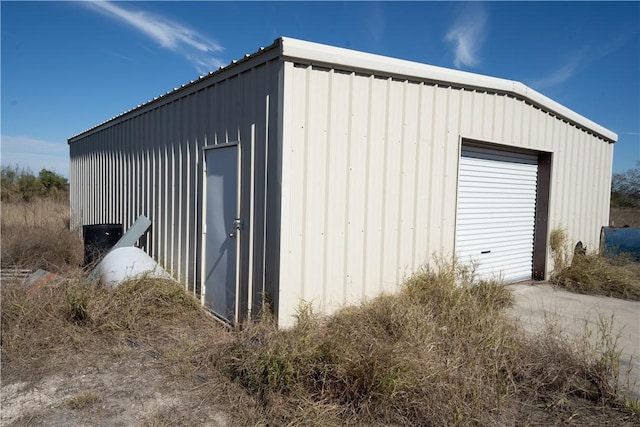 view of outdoor structure with a garage