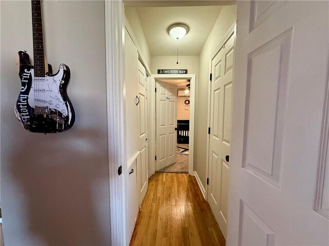 721 S 8th St, Kingsville, TX 78363 - corridor with light wood-style flooring
