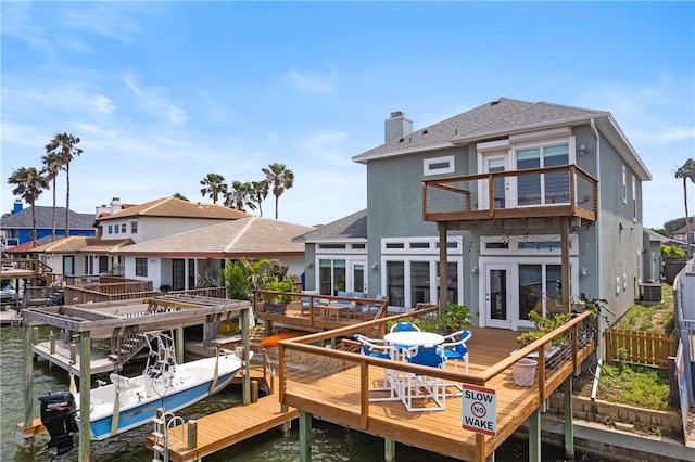 13530 Carlos Fifth Ct, Corpus Christi, TX 78418 - dock area with a residential view, boat lift, and a water view