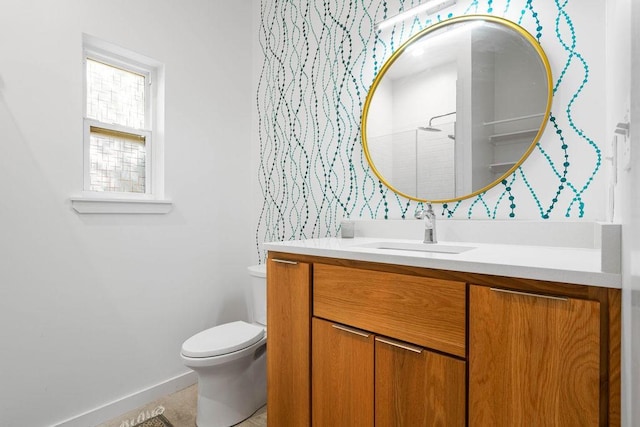 110 Forest Hls, Rockport, TX 78382 - bathroom with toilet, vanity, and baseboards