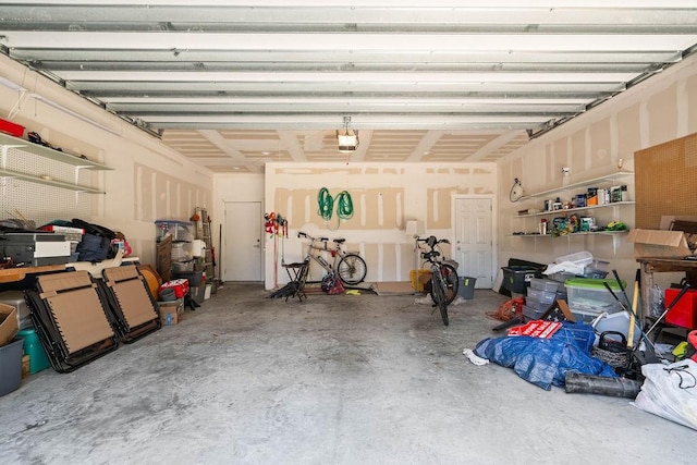 110 Forest Hls, Rockport, TX 78382 - garage featuring a garage door opener