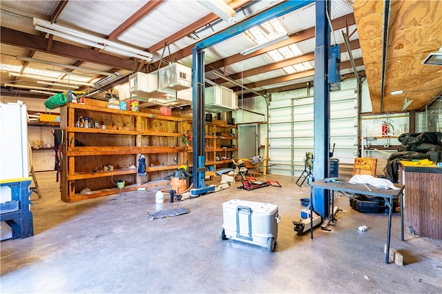 garage with a workshop area