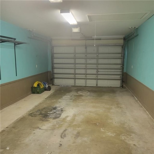 garage featuring wainscoting