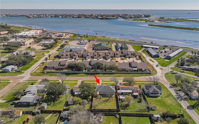 aerial view with a residential view and a water view