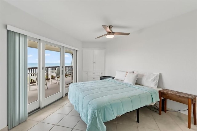 5973 State Highway 361 Unit 436, Port Aransas, TX 78373 - bedroom with access to exterior, light tile patterned floors, a water view, and ceiling fan