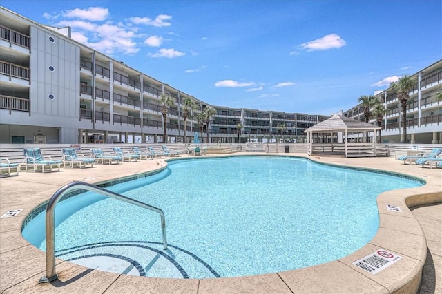 5973 State Highway 361 Unit 436, Port Aransas, TX 78373 - community pool featuring a gazebo and a patio