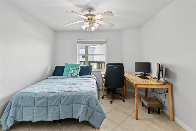 5973 State Highway 361 Unit 436, Port Aransas, TX 78373 - bedroom with an office area, light tile patterned flooring, and a ceiling fan