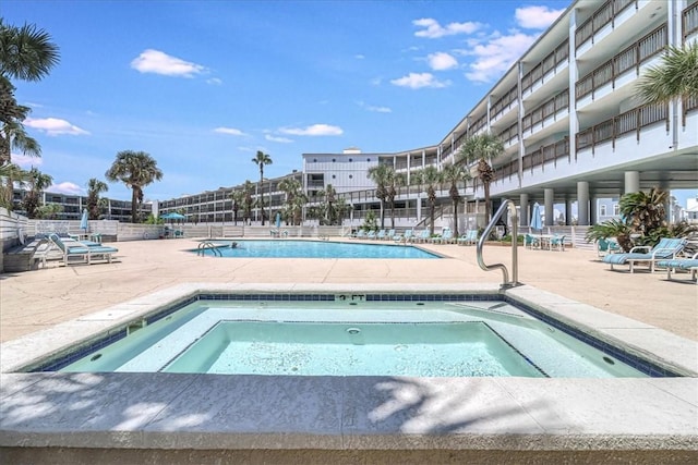 5973 State Highway 361 Unit 436, Port Aransas, TX 78373 - community pool with a patio area and a hot tub