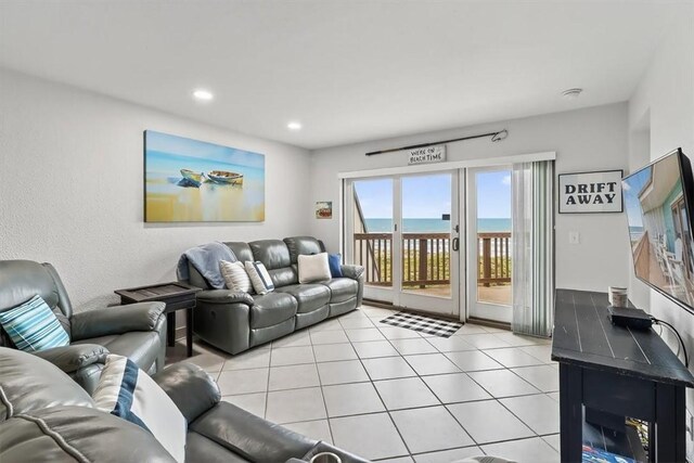 5973 State Highway 361 Unit 436, Port Aransas, TX 78373 - living area with light tile patterned flooring and recessed lighting