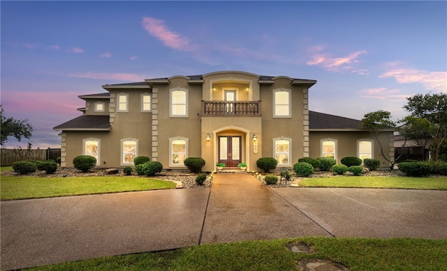 6001 King Trl, Corpus Christi, TX 78414 - view of front of house featuring a balcony, french doors, and stucco siding