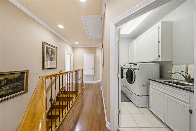 6001 King Trl, Corpus Christi, TX 78414 - washroom featuring attic access, washing machine and dryer, crown molding, recessed lighting, and light tile patterned flooring
