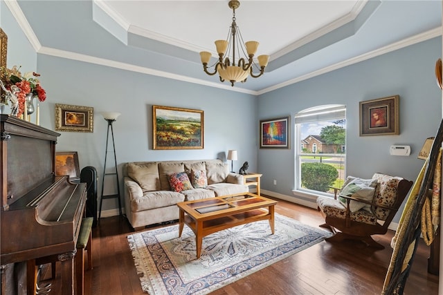 6001 King Trl, Corpus Christi, TX 78414 - living room with a tray ceiling, a chandelier, dark wood-type flooring, and ornamental molding