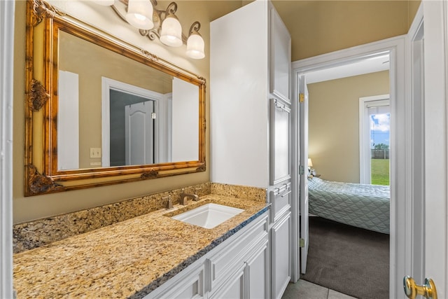 6001 King Trl, Corpus Christi, TX 78414 - ensuite bathroom with vanity and tile patterned flooring