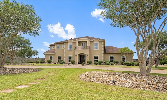 6001 King Trl, Corpus Christi, TX 78414 - mediterranean / spanish-style home with stucco siding and a balcony