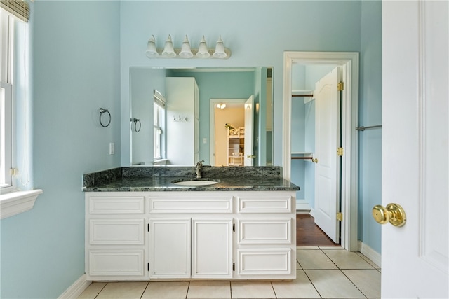 6001 King Trl, Corpus Christi, TX 78414 - bathroom featuring vanity, plenty of natural light, and tile patterned flooring