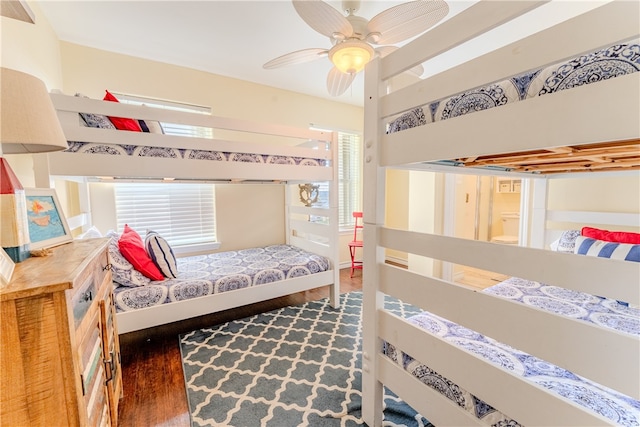 bedroom featuring dark wood-type flooring and ceiling fan