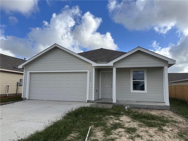 single story home featuring a garage